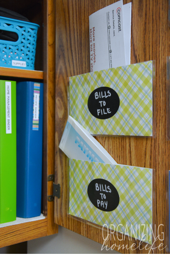 A place for organizing bills - door pockets in a kitchen cabinet