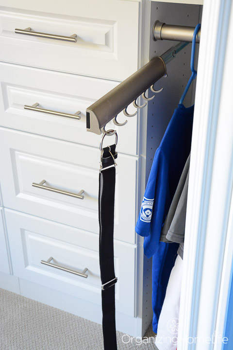 Organizing Belts in a Closet with a Space Saving Slide Out Belt Rack