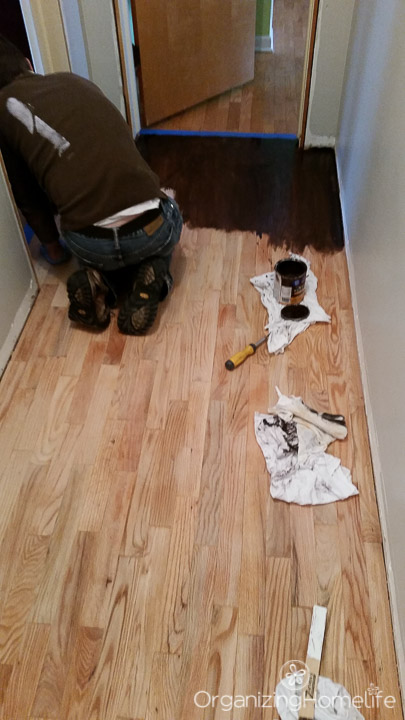 Hardwood floor refinishing - applying stain | Organizing Homelife